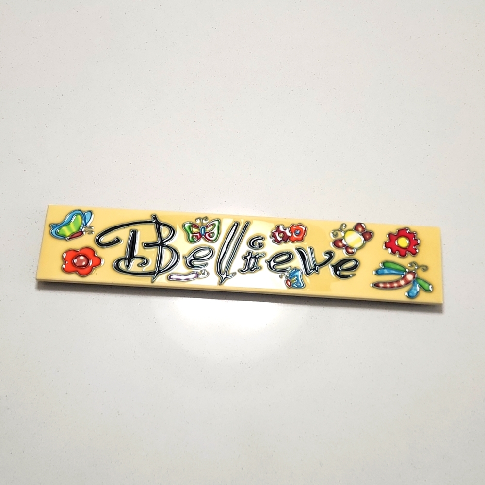 Beautiful En Vogue Art on Tile Ceramic Tile with Believe written on it